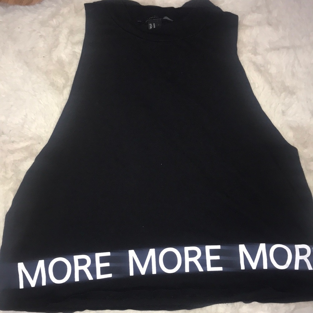 I’m selling a black cropped t shirt .